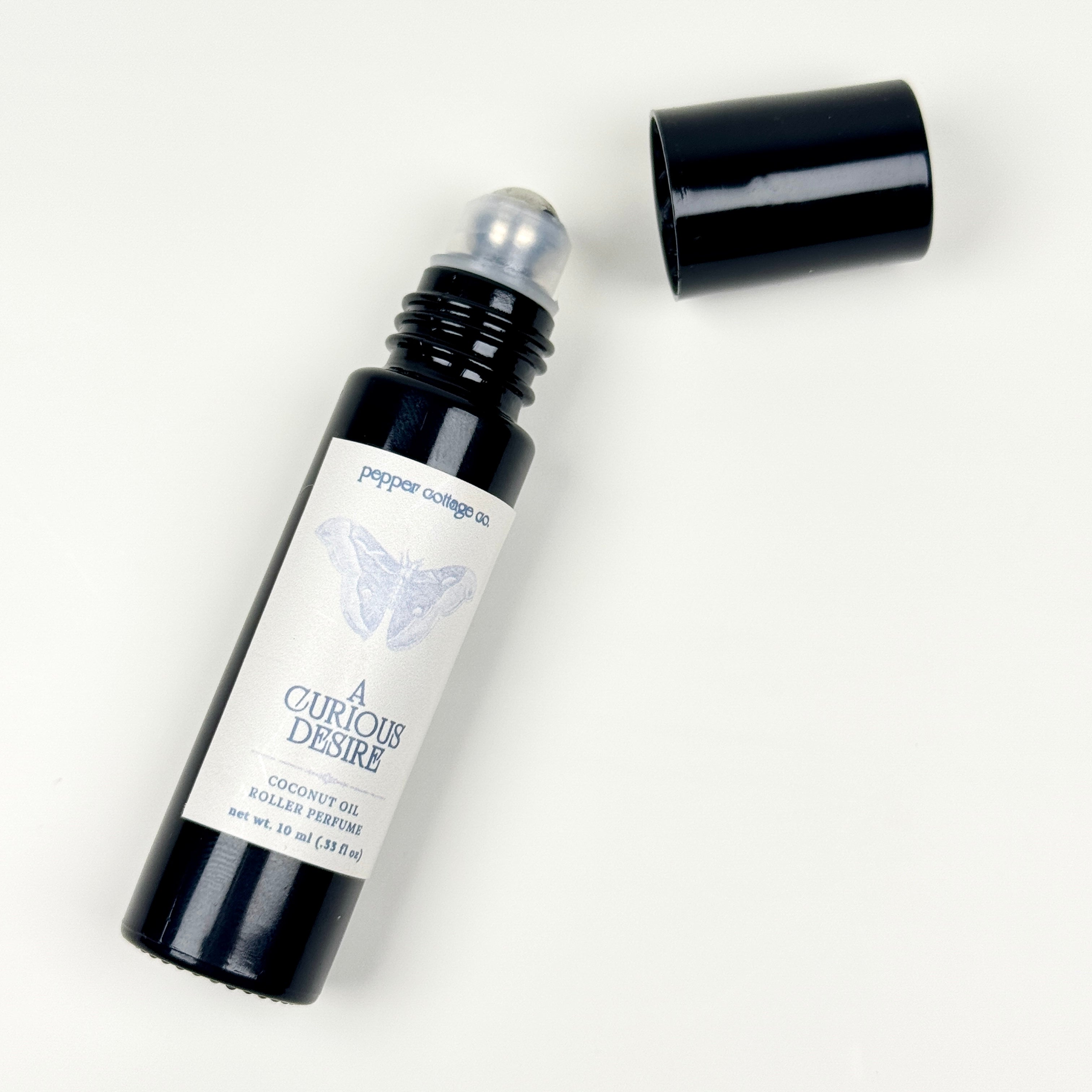 A Curious Desire Roller Perfume | Fig, Violet, Plum, Sandalwood, Plum, Amber, Vanilla | Dark Academia Coconut Oil Roller Perfume
