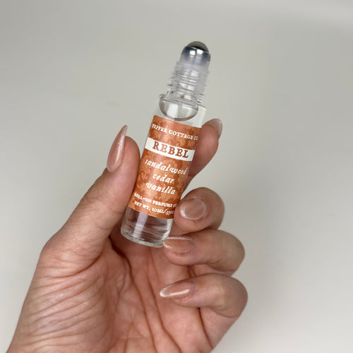 REBEL: Sandalwood, Cedar, & Vanilla 10 mL Moisturizing Coconut Oil Roller Ball Perfume