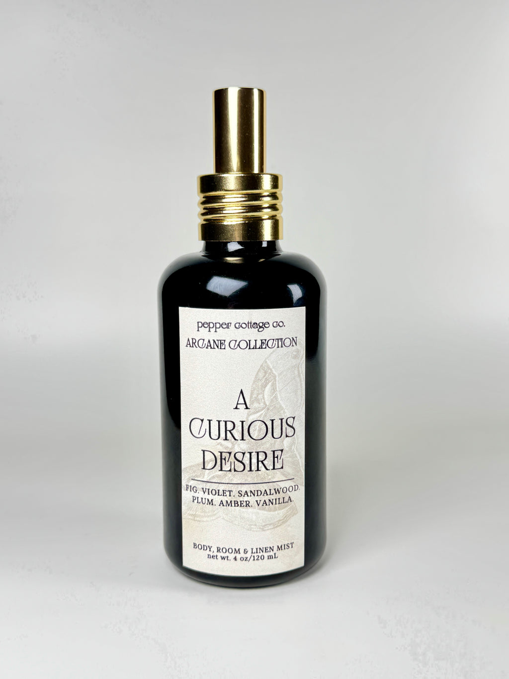 A Curious Desire 4 oz Body, Room, and Linen Mist | Fig, Violet, Plum, Sandalwood, Amber, Vanilla | Sultry Feminine Dark Academia-Inspired Body & Room Mist
