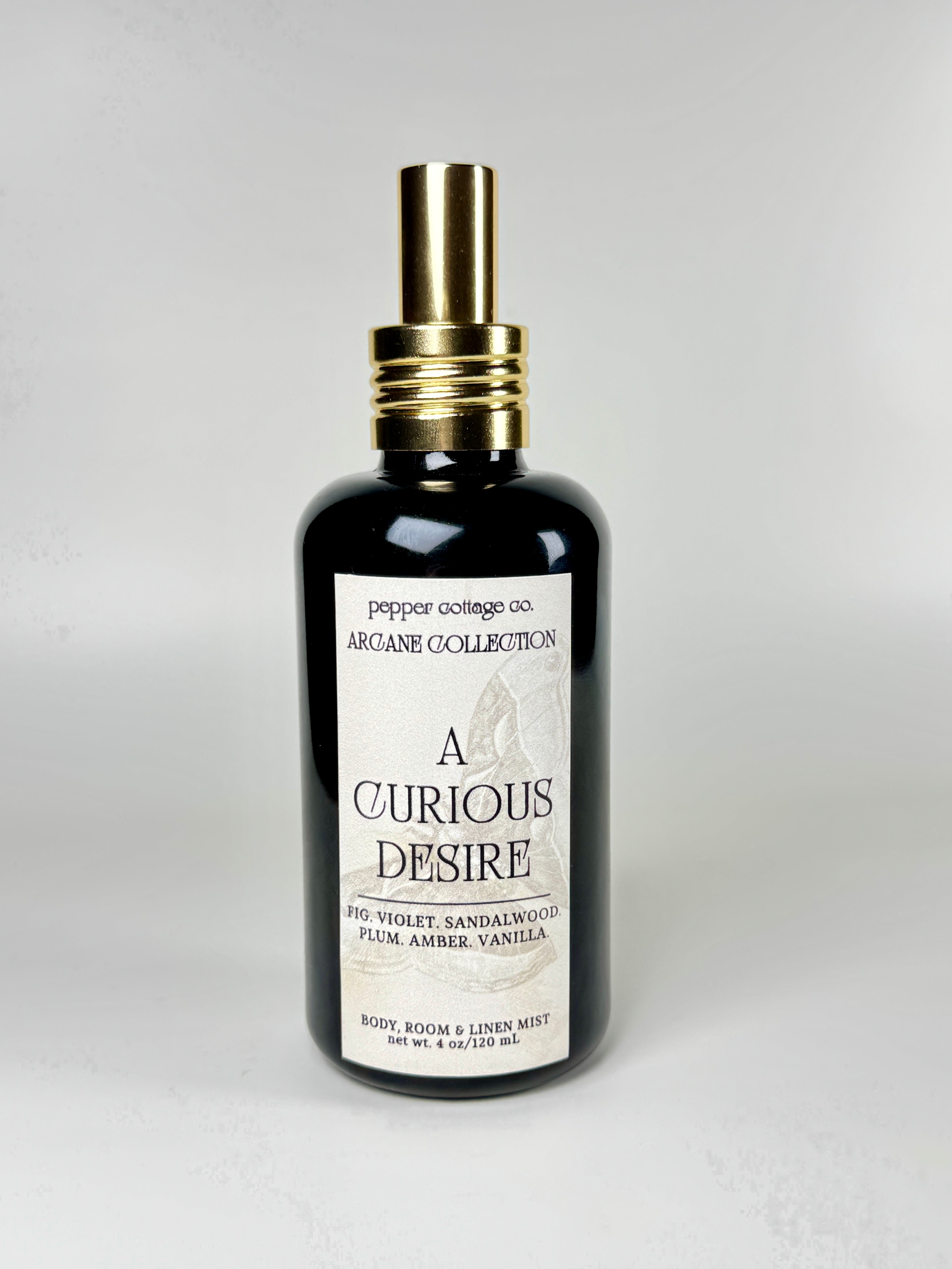 A Curious Desire 4 oz Body, Room, and Linen Mist | Fig, Violet, Plum, Sandalwood, Amber, Vanilla | Sultry Feminine Dark Academia-Inspired Body & Room Mist