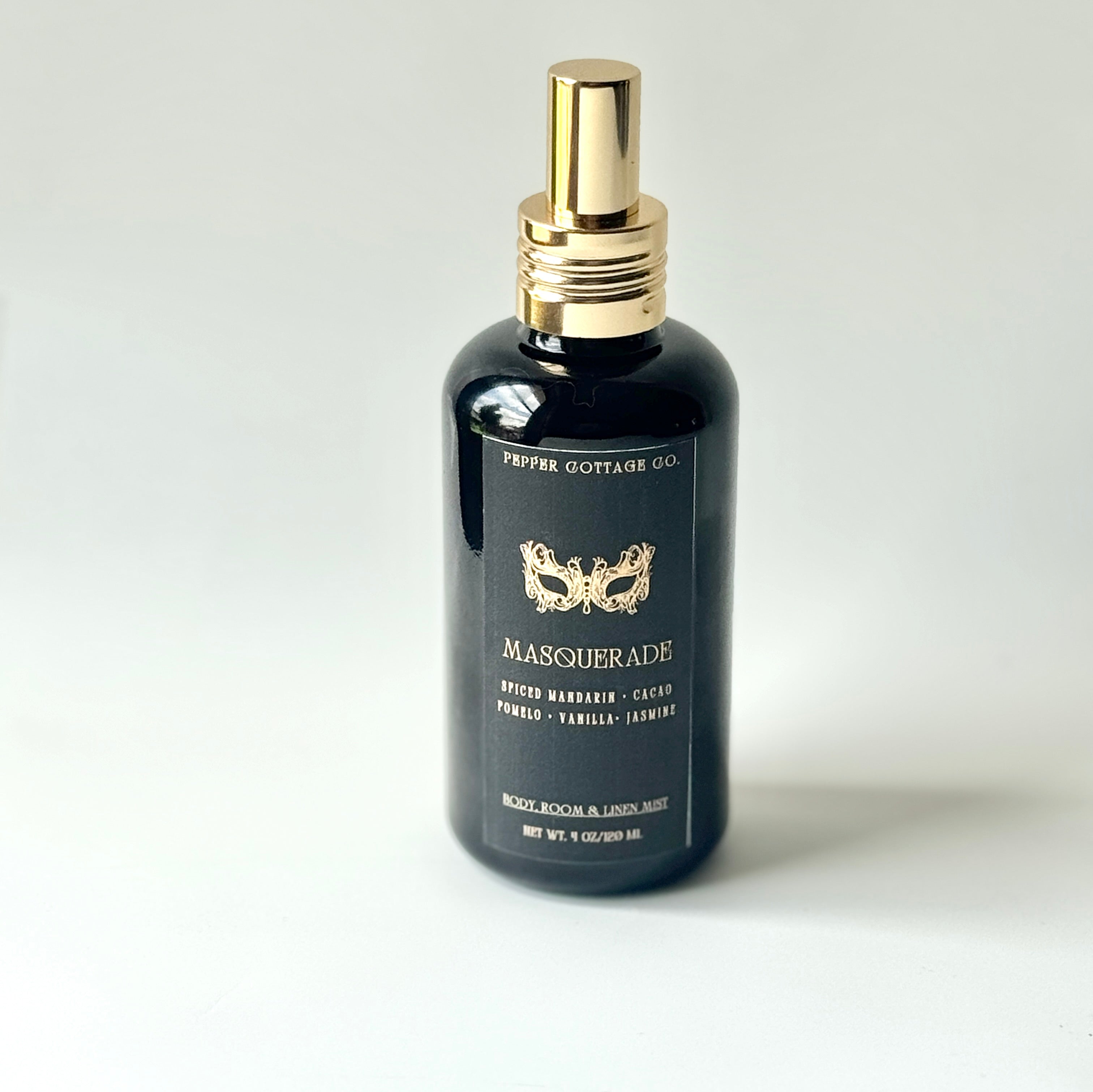 Masquerade 4 oz Body + Home Mist | Spiced Mandarin, Cacao, Pomelo, Vanilla, Jasmine | Spicy Citrus Floral Dark Academia-Inspired Body Mist